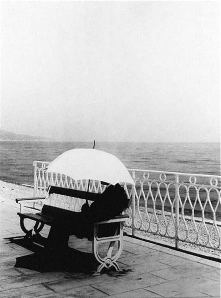 Brassai's Contemporary Photography - The man with white umbrella 1934