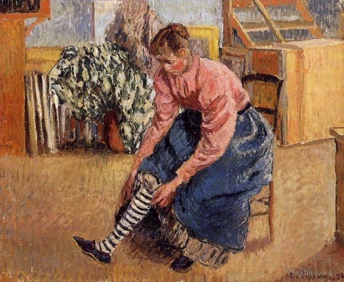Camille Pissarro Oil Painting - Woman putting on her stockings 1895
